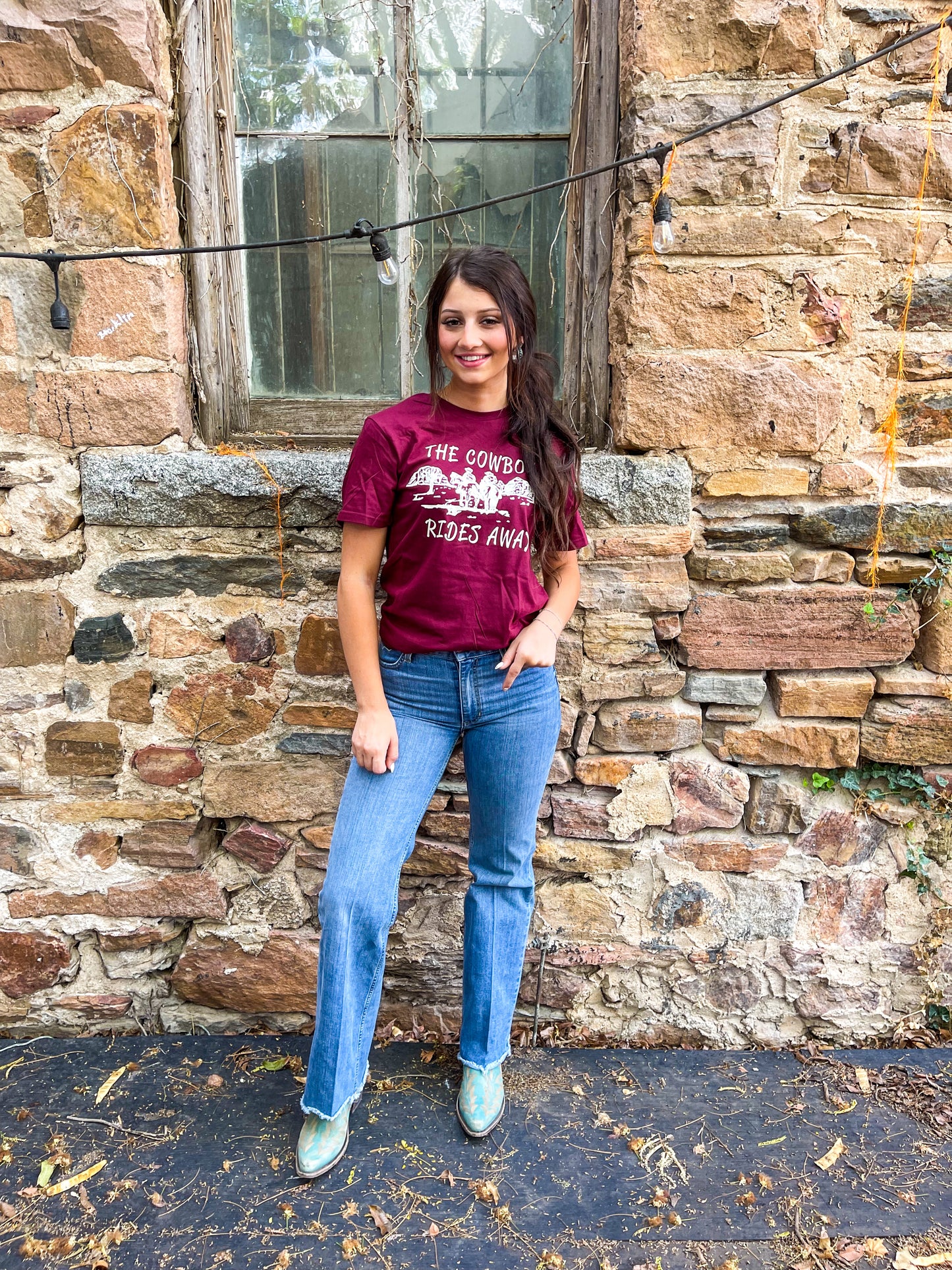 The cowboy rides away western graphic tee