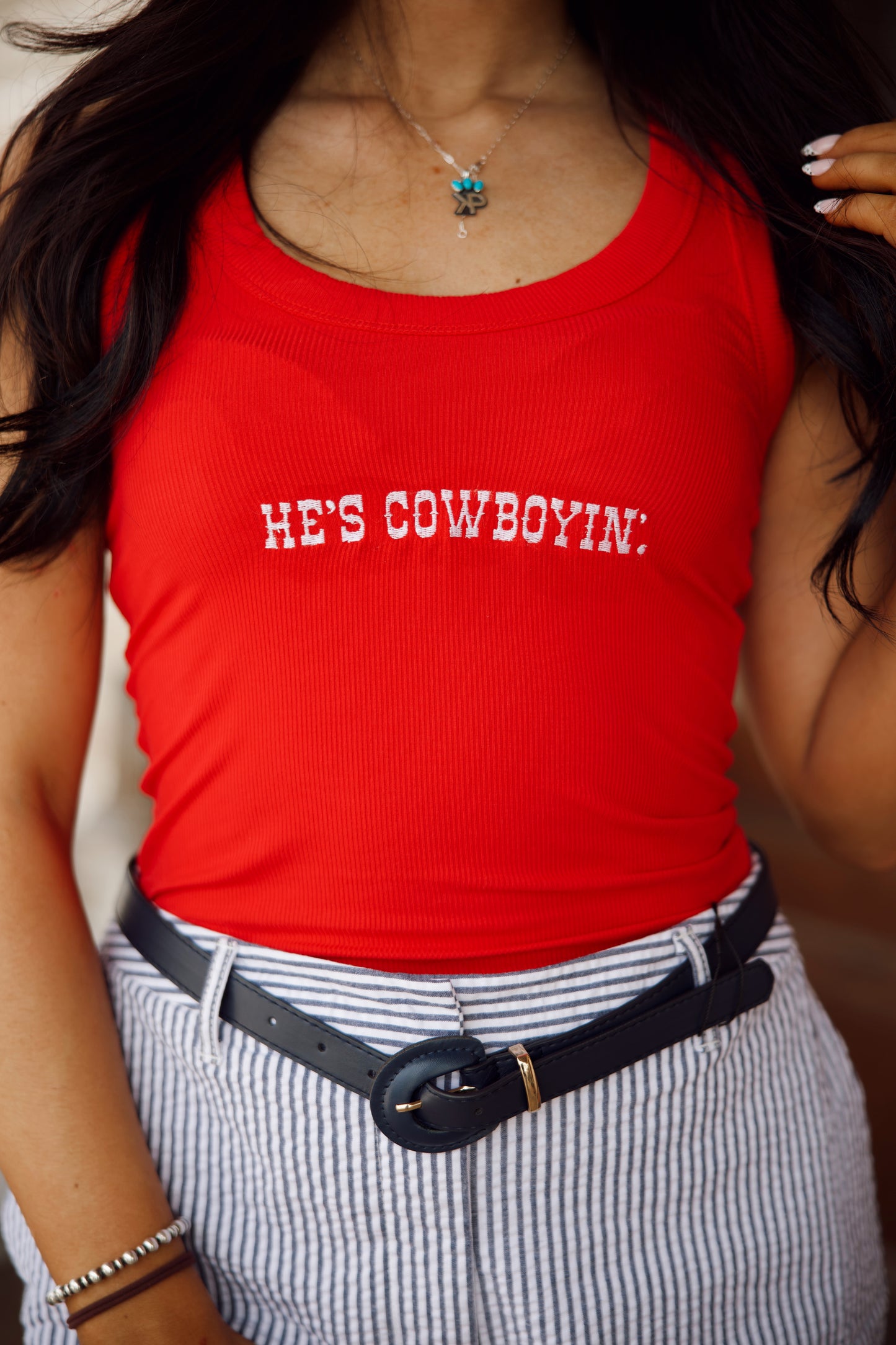 He’s Cowboyin tank top